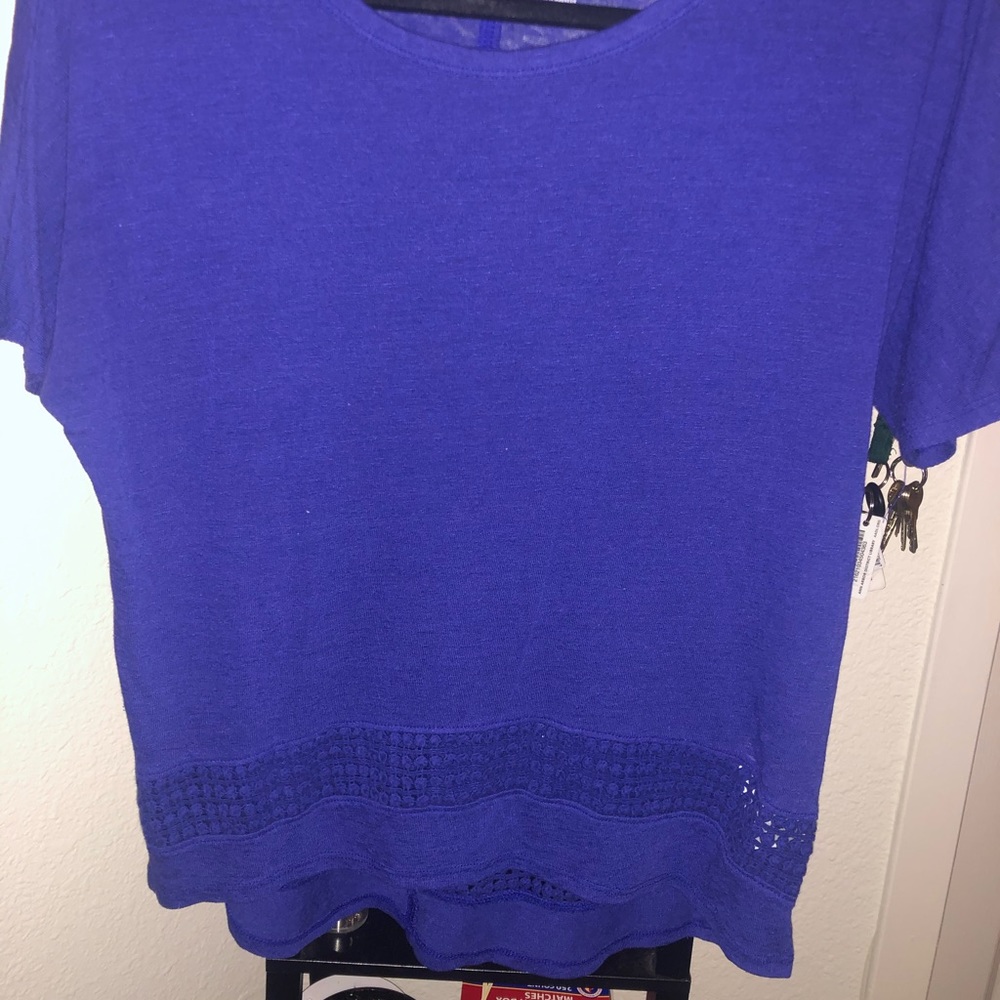 Blue top with detail at bottom